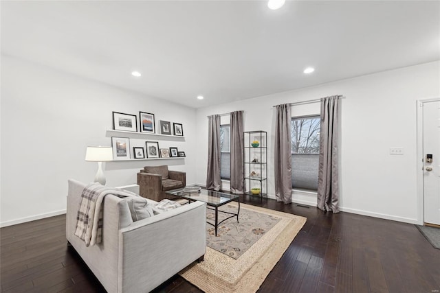 living room featuring dark hardwood / wood-style floors