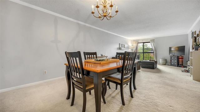 carpeted dining room with an inviting chandelier, ornamental molding, and a textured ceiling