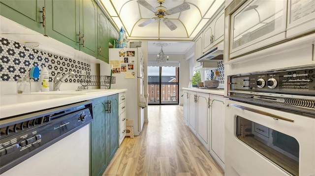 kitchen featuring stove, white refrigerator, light hardwood / wood-style floors, ceiling fan with notable chandelier, and stainless steel dishwasher