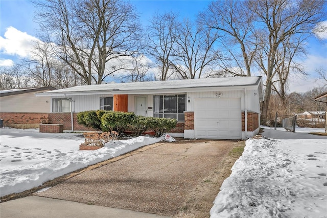 single story home featuring a garage