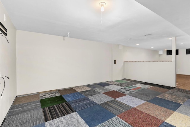 interior space with dark colored carpet