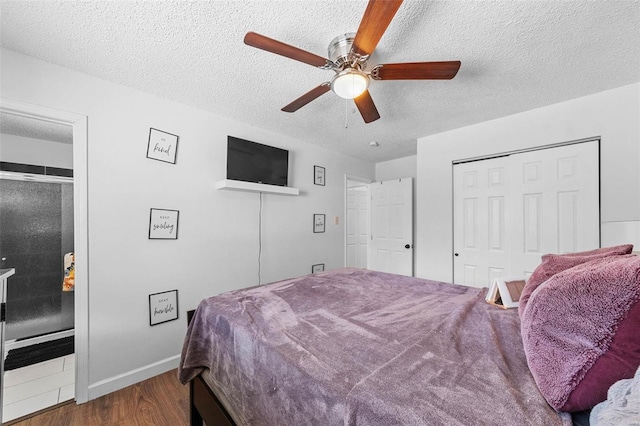 bedroom with hardwood / wood-style floors, a textured ceiling, and ceiling fan