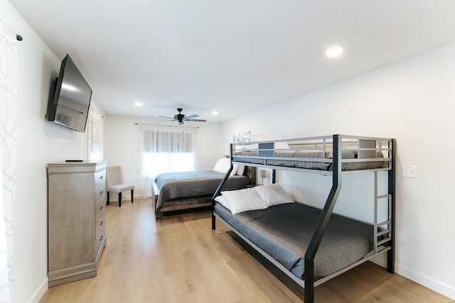 bedroom featuring a ceiling fan, light wood-type flooring, baseboards, and recessed lighting