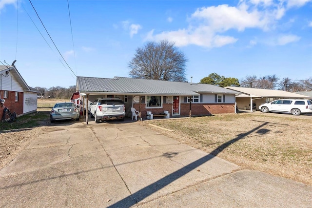 single story home with a carport