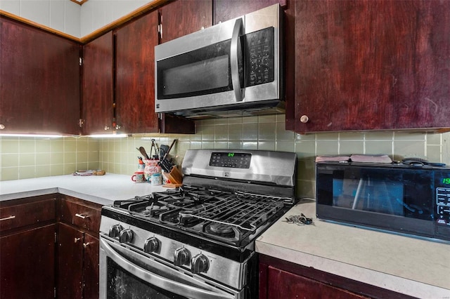 kitchen featuring backsplash and appliances with stainless steel finishes