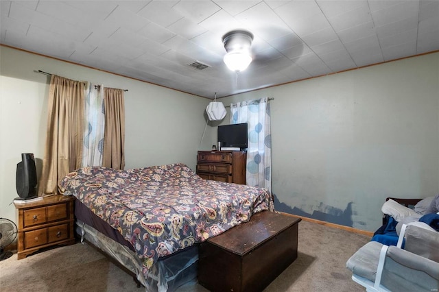 bedroom featuring light colored carpet