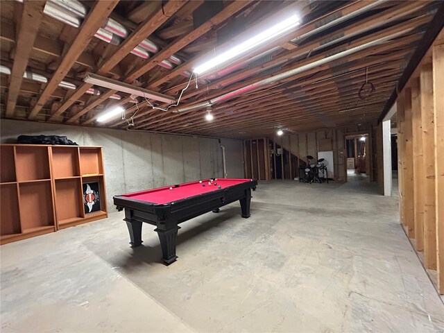 playroom featuring pool table and concrete floors