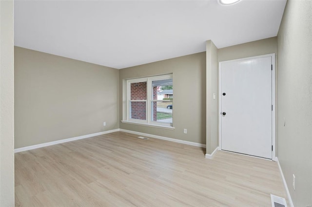 entrance foyer with light hardwood / wood-style flooring