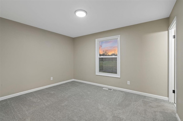 view of carpeted spare room