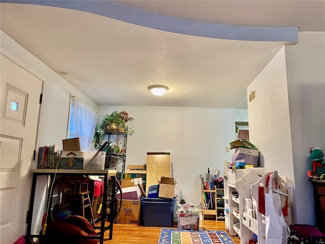 office with wood-type flooring