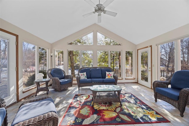 sunroom featuring ceiling fan and vaulted ceiling