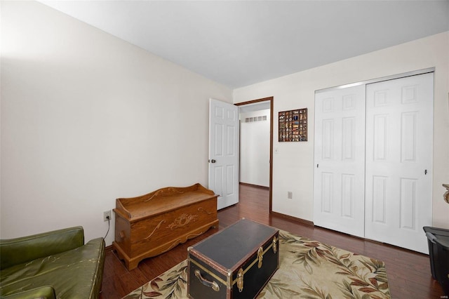 living area with dark wood-type flooring