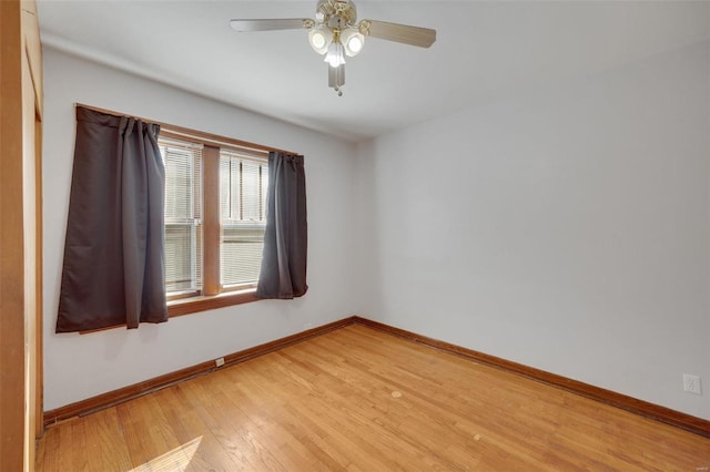 unfurnished room with wood-type flooring and ceiling fan