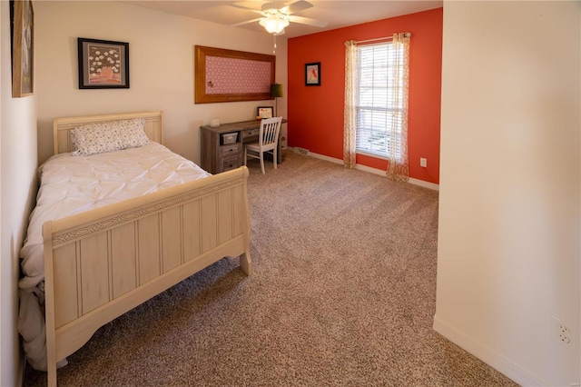 bedroom featuring ceiling fan and carpet flooring