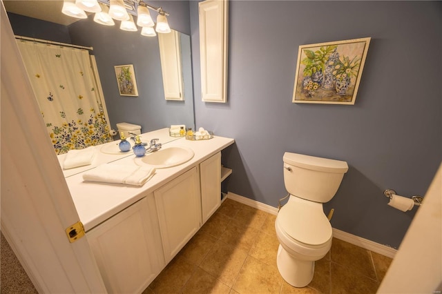 bathroom with a shower with curtain, vanity, toilet, and tile patterned flooring