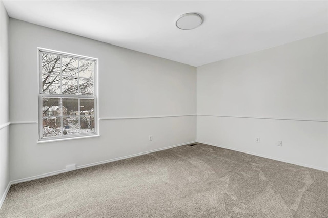 view of carpeted spare room