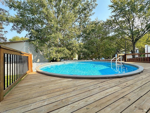 view of pool with a deck