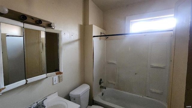 full bathroom with shower / bathing tub combination, sink, and toilet