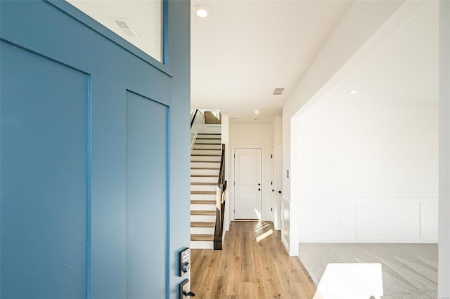 hallway with light wood-type flooring