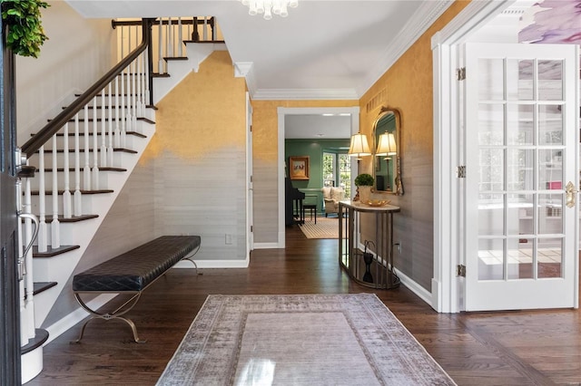 entryway featuring dark hardwood / wood-style floors and ornamental molding