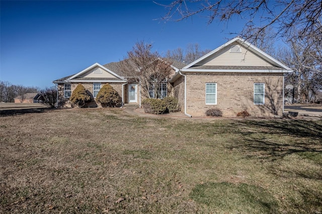 view of front of home with a front lawn