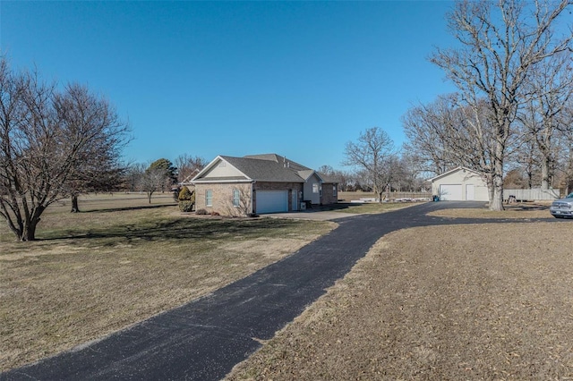 view of side of property featuring a lawn