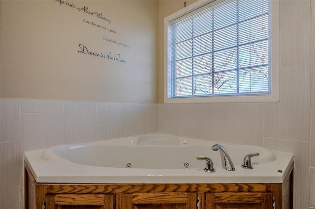 bathroom featuring a washtub