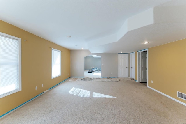 empty room featuring light colored carpet