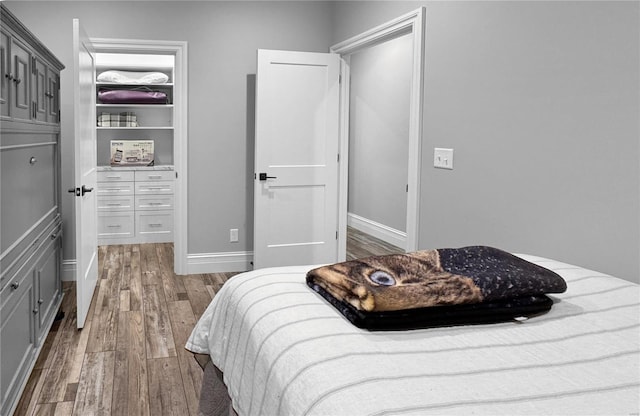 bedroom with light hardwood / wood-style floors