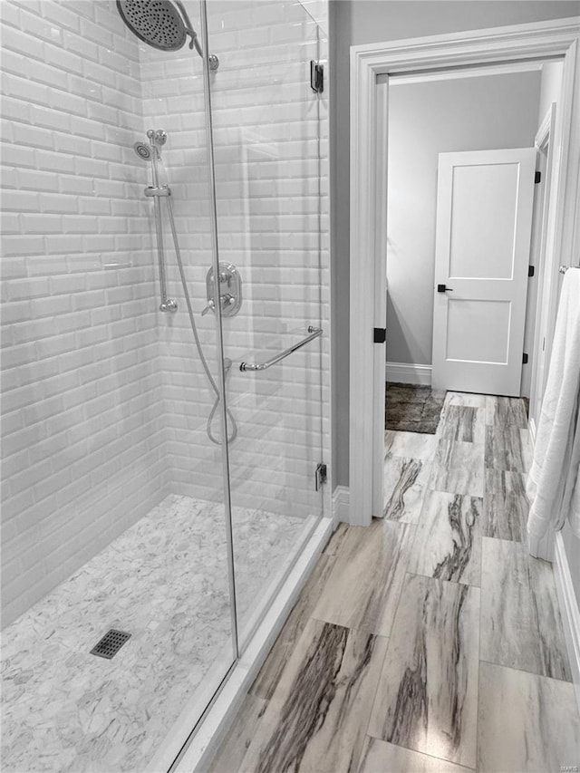 bathroom with an enclosed shower