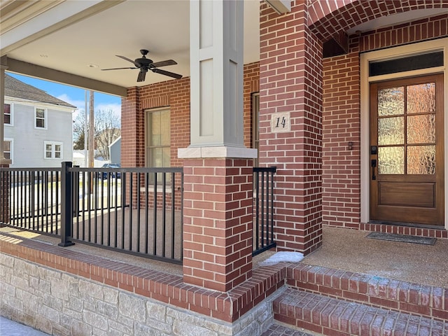 property entrance with covered porch and ceiling fan