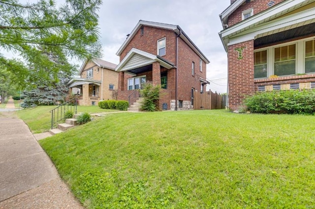 view of home's exterior with a yard