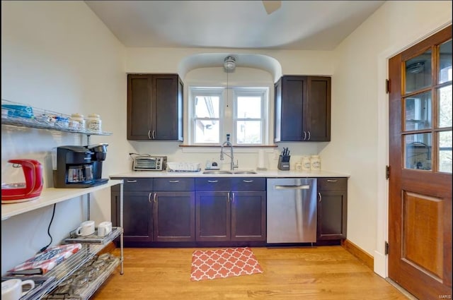 kitchen featuring sink, light hardwood / wood-style floors, dishwasher, and dark brown cabinetry