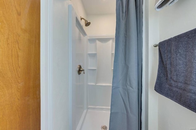 bathroom featuring walk in shower