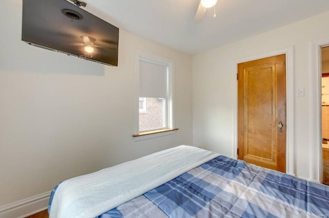 bedroom featuring ceiling fan