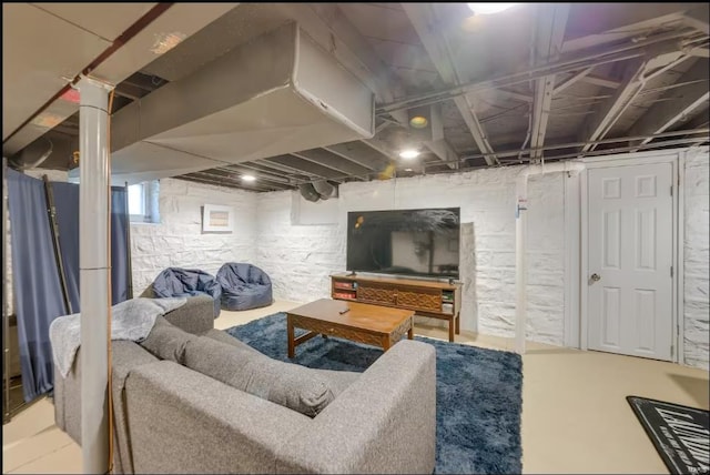 living room with concrete flooring