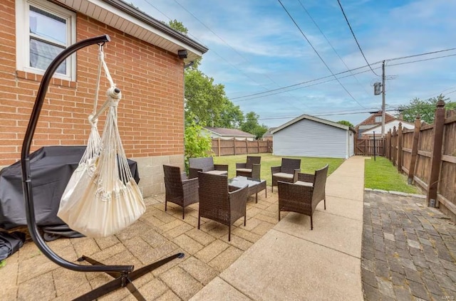 view of patio featuring an outdoor structure and outdoor lounge area