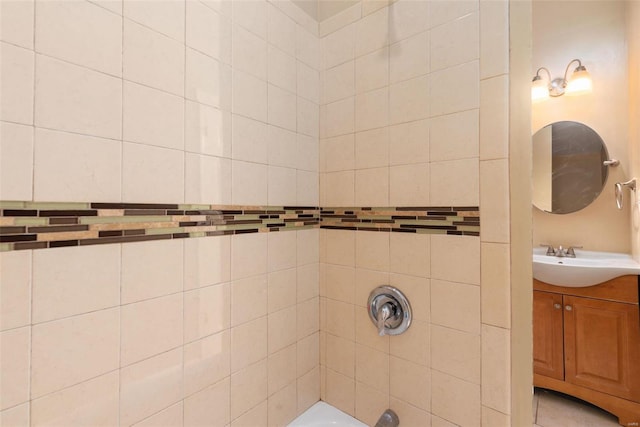 bathroom with vanity and tiled shower / bath combo