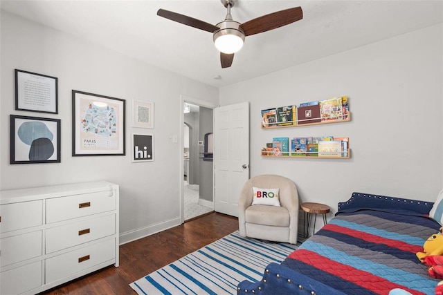 bedroom with baseboards, arched walkways, ceiling fan, and dark wood-style flooring