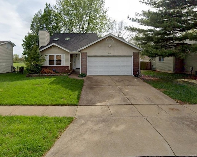 ranch-style home with brick siding, a garage, driveway, and a chimney