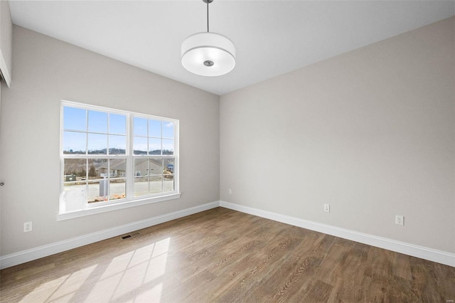 empty room featuring light hardwood / wood-style floors