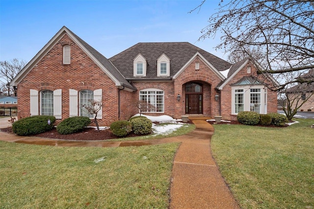 view of front facade with french doors and a front yard