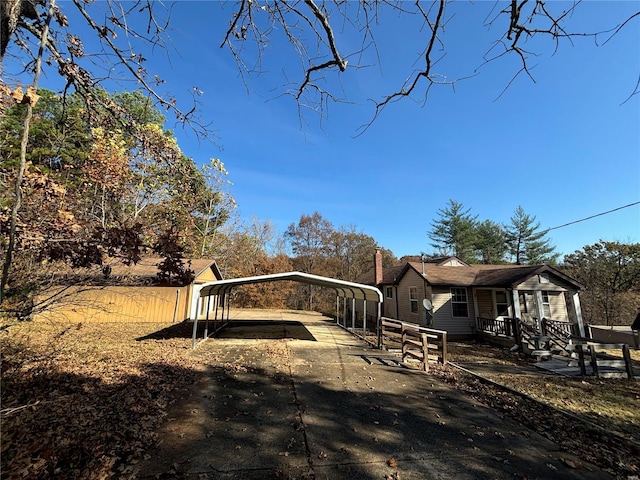 view of yard with a carport