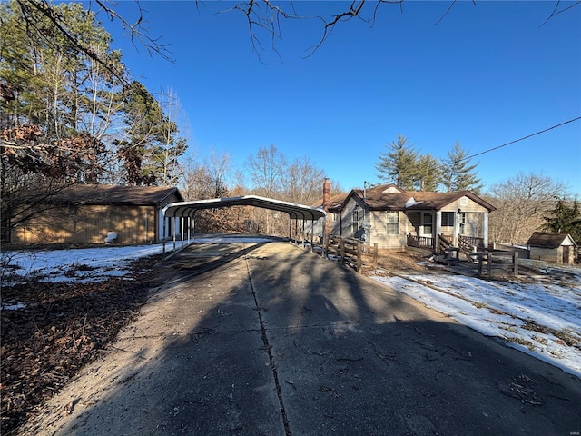 view of front of house featuring a carport