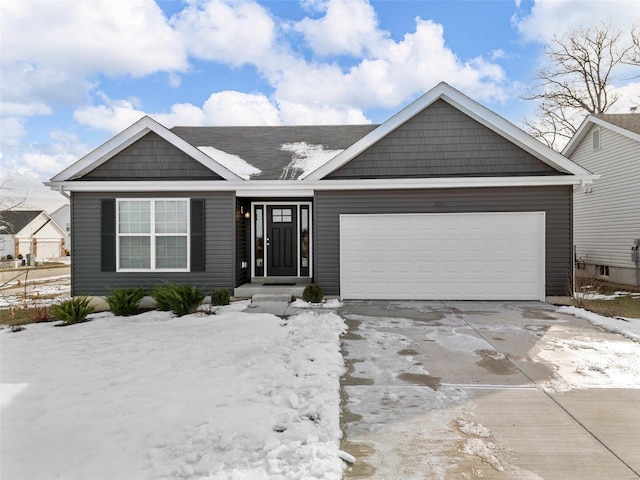 view of front of house featuring an attached garage and concrete driveway