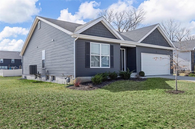 view of front of house featuring a front lawn, an attached garage, and concrete driveway