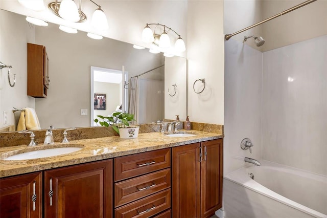 bathroom with washtub / shower combination and vanity