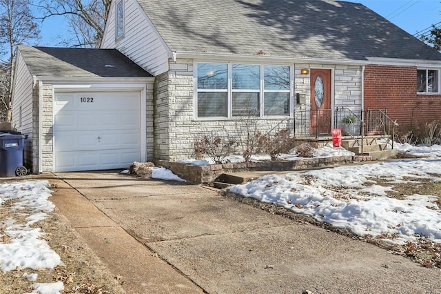 view of front of home with a garage