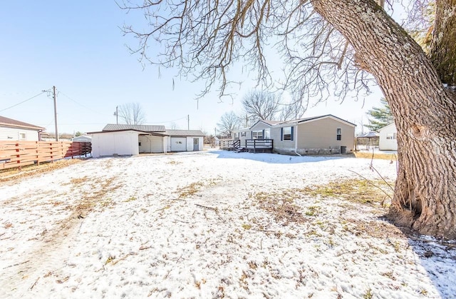 view of snow covered property