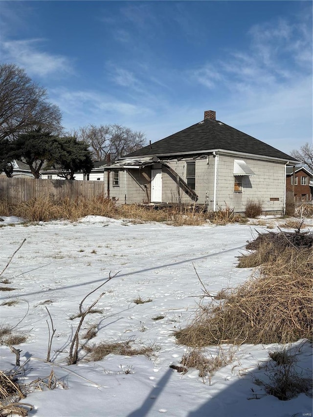 view of snow covered property